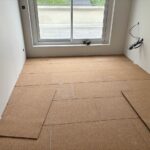 Rénovation acoustique de sol d’appartement avec pose d’une sous-couche liège pour l’affaiblissement des bruits d’impact à Saint-Louis à côté de Huningue 3 frontières