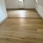 Rénovation en pose collée de parquet chêne vernis naturel Colmar Haut Rhin