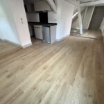 Rénovation en pose collée de parquet chêne vernis naturel Colmar Haut Rhin