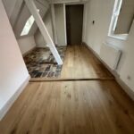 Rénovation en pose collée de parquet chêne vernis naturel Colmar Haut Rhin