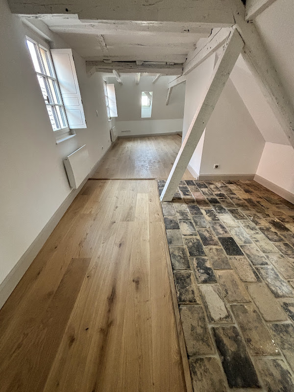 Rénovation en pose collée de parquet chêne vernis naturel Colmar Haut Rhin