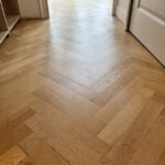 Rénovation par ponçage et vitrification de parquet massif vernis à Colmar Haut Rhin