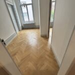 Rénovation par ponçage et vitrification de parquet massif vernis à Colmar Haut Rhin