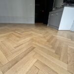 Rénovation par ponçage et vitrification de parquet massif vernis à Colmar Haut Rhin