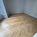 Rénovation par ponçage et vitrification de parquet massif vernis à Colmar Haut Rhin