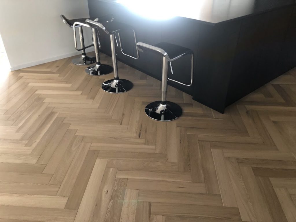 Rénovation parquet chevron Sigolsheim : ponçage et vitrification Haut-Rhin