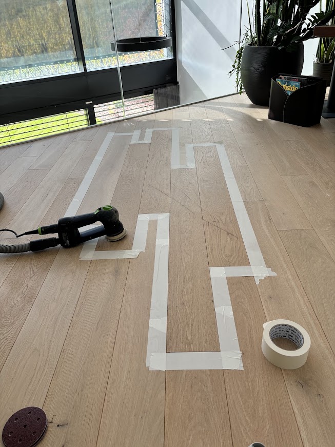 Réparation lames parquet milieu pièce : Colmar Haut-Rhin